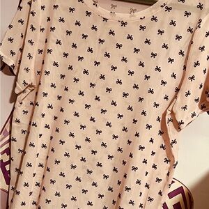Free Kisses Pink Top with Black Bow Design